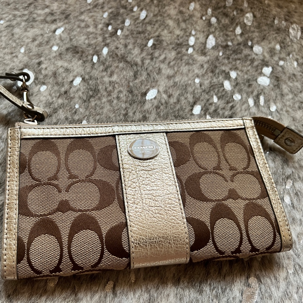 Coach wallet, camel and gold tone.
